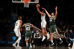 开云官网-湖人鏖战篮网B队，布克关键制胜的简单介绍